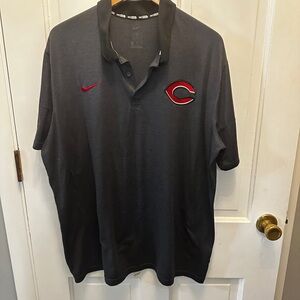 Nike Men's very Dark Gray Polo with Red Cincinnati Reds and Nike logos.